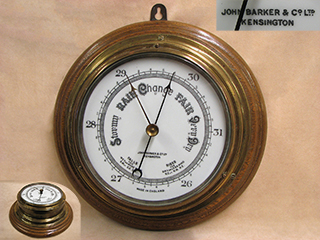 Antique Ships aneroid bulkhead barometer signed John Barker Kensington.